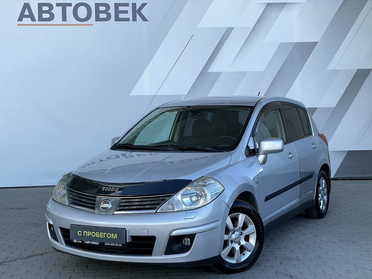 Открыть фотографии: Nissan Tiida I