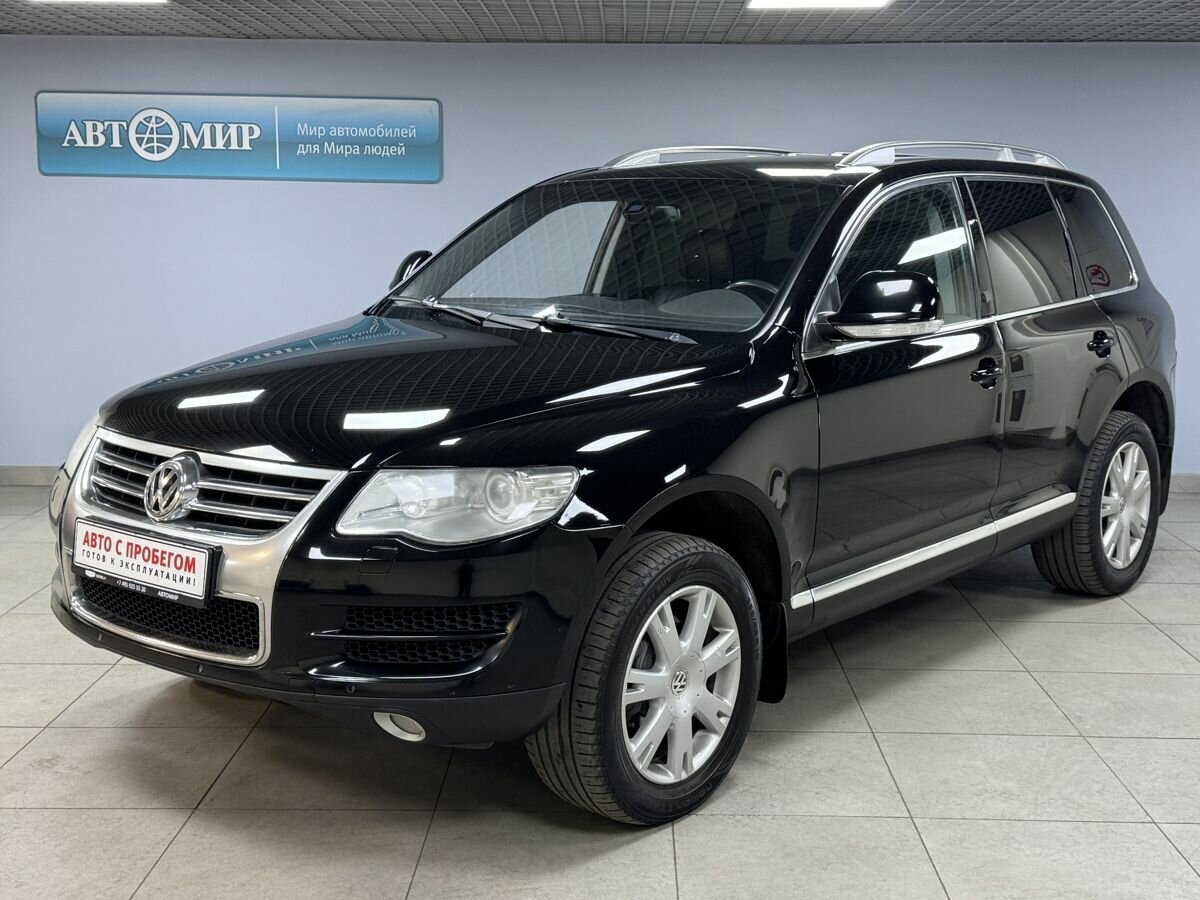 Открыть фотографии: Volkswagen Touareg I Рестайлинг