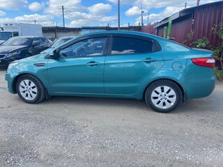 2014 Kia Rio 6-speed III, зелёный, 910000 рублей, вид 4
