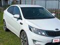 2012 Kia Rio 4-speed III, белый, 875000 рублей - вид 2
