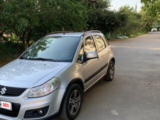 2011 Suzuki SX4 I (Classic) Рестайлинг, серебристый, 850000 рублей, вид 2