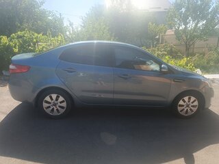 2013 Kia Rio 4-speed III, голубой, 860000 рублей, вид 4