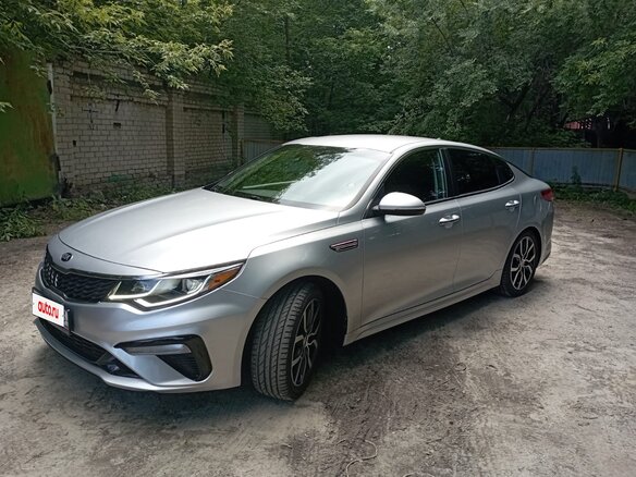 2019 Kia Optima IV Рестайлинг, серый, 2300000 рублей - вид 1