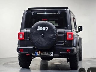 2022 Jeep Wrangler IV (JL), серый, 5339000 рублей, вид 4