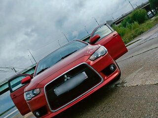 2011 Mitsubishi Lancer X Рестайлинг, красный, 720000 рублей, вид 3