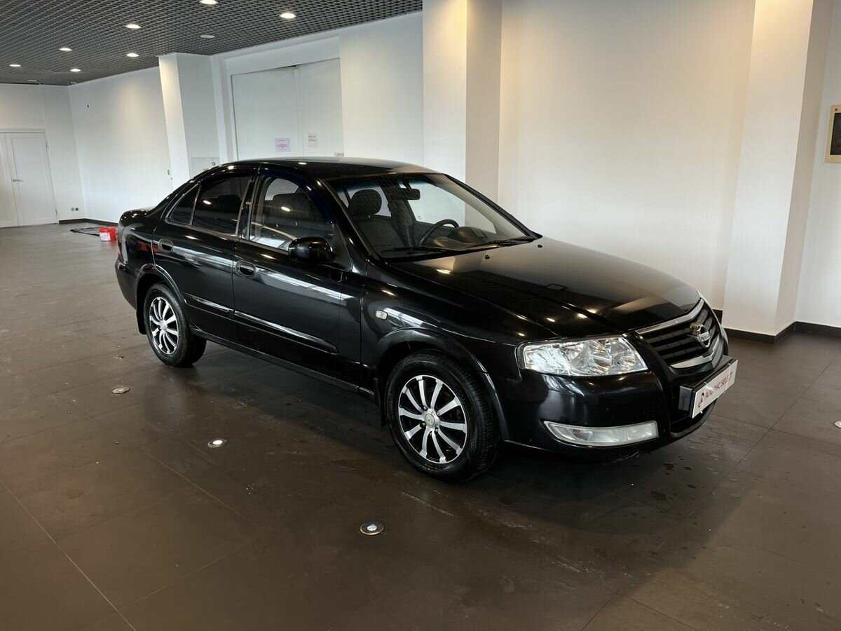 Открыть фотографии: Nissan Almera Classic I