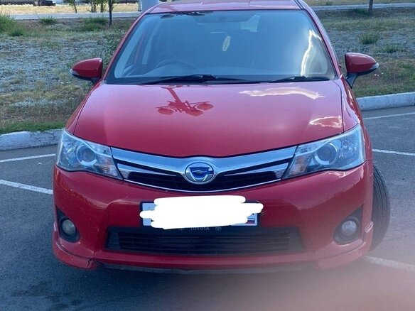 2014 Toyota Corolla Fielder XI (E160, E170, E180), красный, 1300000 рублей