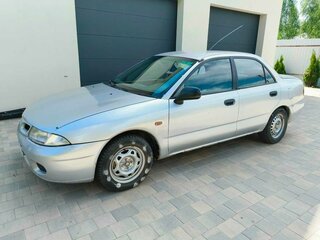 1998 Mitsubishi Carisma I, серебристый, 290000 рублей, вид 1
