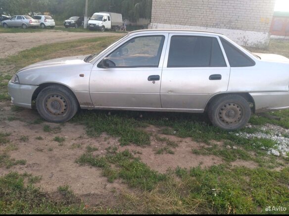 2012 Daewoo Nexia I Рестайлинг, серебристый, 200000 рублей - вид 2