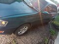 1994 Toyota Corona IX (T190), синий, 190000 рублей - вид 4