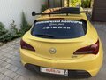2014 Opel Astra GTC J Рестайлинг, жёлтый - вид 1