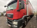 2011 MAN TGS, красный, 4500000 рублей - вид 1