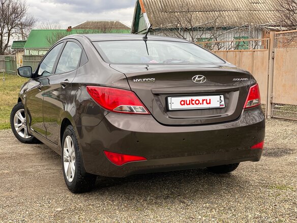 2014 Hyundai Solaris I Рестайлинг, коричневый, 1150000 рублей - вид 6