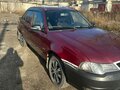 2012 Daewoo Nexia I Рестайлинг, красный, 100000 рублей - вид 1