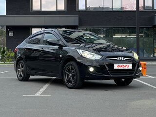 2011 Hyundai Solaris I, чёрный, 719000 рублей, вид 1