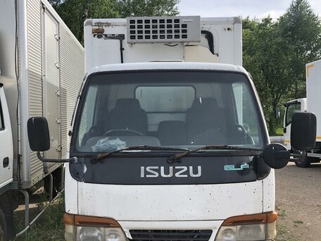 1987 Isuzu Elf (N-series), белый, 800000 рублей, вид 1