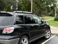 2004 Mitsubishi Outlander I, чёрный, 620000 рублей - вид 3