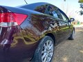 2010 Kia Cerato 6-speed II, пурпурный, 700000 рублей - вид 7