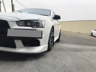 2010 Mitsubishi Lancer Evolution X, белый, 5000000 рублей, вид 4