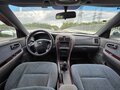 2006 Kia Magentis I Рестайлинг, серебристый, 210000 рублей - вид 8