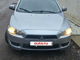 2009 Mitsubishi Lancer X, серебристый, 550000 рублей, вид 1