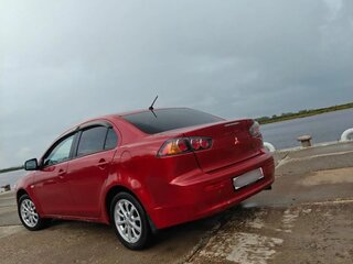 2011 Mitsubishi Lancer X Рестайлинг, красный, 720000 рублей, вид 5
