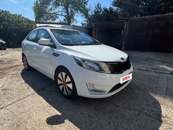2011 Kia Rio 4-speed III, белый, 1050000 рублей - вид 2