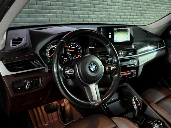 2021 BMW X1 20i xDrive II (F48) Рестайлинг, синий - вид 12