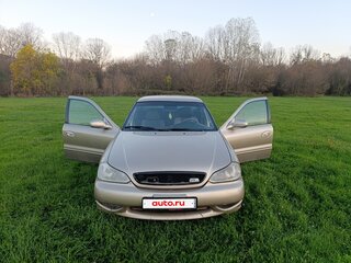 2001 Kia Clarus II, бежевый, 300000 рублей, вид 2