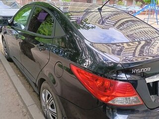 2011 Hyundai Solaris I, чёрный, 599000 рублей, вид 4