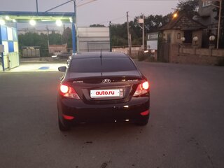 2013 Hyundai Solaris I, чёрный, 930000 рублей, вид 4