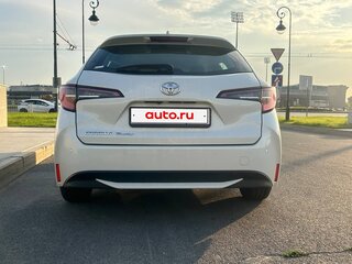 2021 Toyota Corolla XII (E210), белый, 2002000 рублей, вид 4