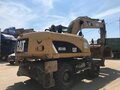 2013 Caterpillar M317, жёлтый - вид 4