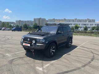 2001 Toyota Land Cruiser 100 Series, серый, 3500000 рублей, вид 2
