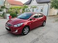 2012 Hyundai Solaris I, красный, 850000 рублей