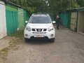 2012 Nissan X-Trail II Рестайлинг, белый - вид 1