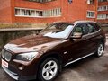 2011 BMW X1 28i I (E84), коричневый, 1500000 рублей