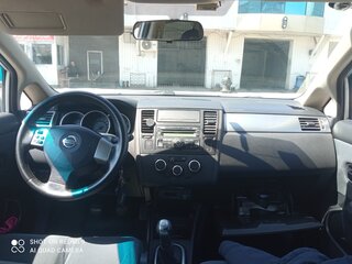2008 Nissan Tiida I, серебристый, 625000 рублей, вид 5