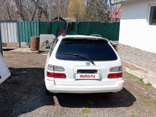 1999 Toyota Corolla VII (E100), белый, 270000 рублей, вид 4