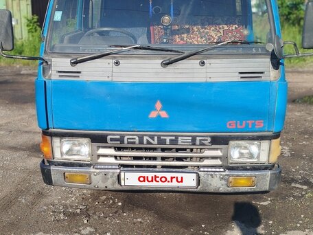 1990 Mitsubishi L-Series, синий, 820000 рублей, вид 1