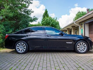 2009 BMW 7 серии 750i xDrive V (F01/F02/F04), чёрный, 3190000 рублей, вид 2
