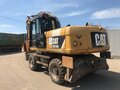 2013 Caterpillar M317, жёлтый - вид 6