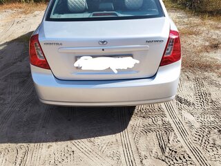 2014 Daewoo Gentra II, серебристый, 750000 рублей, вид 4