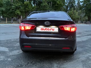 2012 Kia Rio 4-speed III, чёрный, 680000 рублей, вид 3