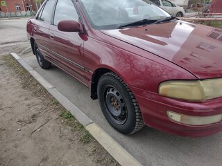 1993 Toyota Carina VI (T190), красный, 300000 рублей, вид 2