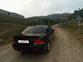 2007 Mitsubishi Lancer IX Рестайлинг, чёрный, 450000 рублей, вид 3