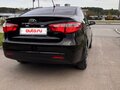 2014 Kia Rio 6-speed III, чёрный, 820000 рублей - вид 7
