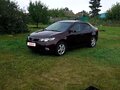 2010 Kia Cerato 6-speed II, пурпурный, 600000 рублей - вид 1