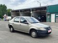 2013 Renault Logan I Рестайлинг, коричневый, 205000 рублей - вид 2
