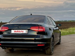 2014 Volkswagen Jetta VI Рестайлинг, чёрный, 1080000 рублей, вид 4